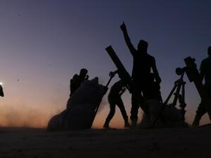 Fighters from the Free Syrian Army cheer and react as they fight against the Islamic State (IS) group jihadists on the outskirts of the northern Syrian town of Dabiq, on October 15, 2016. (AFP/Nazeer al-Khatib)