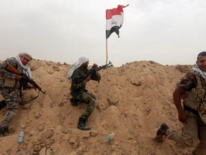 Members of the Iran-backed Shiite militia Popular Mobilization Forces in Iraq. (AFP/ File Photo)