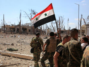 Some of the military positions of the Assad regime were hit by rockets in Syria. (AFP/ File Photo)