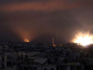 Explosions light the sky over the rebel enclave of Eastern Ghouta. (AFP, Photo/Mohammed Eyad)
