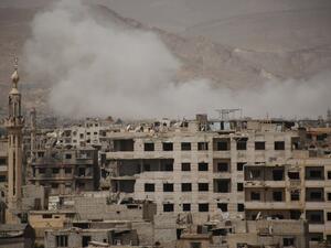 A picture shows smoke billowing following reported air strikes on rebel positions in the opposition-controlled district of Qaboun on the outskirts of the Syrian capital Damascus in the Eastern Ghouta region on April 27, 2017. (AFP/Ammar Suleiman)