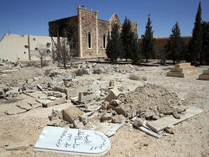 Syrian regime forces raided graveyards looking for valuables. (AFP/ File Photo of destroyed graveyard)