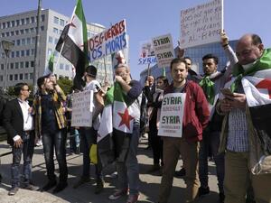 People demonstrate in Brussels on April 8, 2017, in support of the Syrian people after the latest suspected chemical attack. (AFP/Nicolas Maeterlinck)