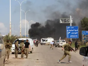 Smoke billowing following a suicide car bombing in Rashidin, west of Aleppo, that targeted buses carrying Syrians evacuated from two besieged government-held towns of Fuaa and Kafraya. (AFP)