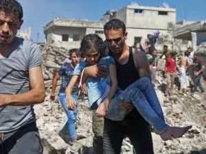 SNC Urges international community to denounce the crimes against Syrians committed in the southwestern Daraa. (AFP/Ahmad al-Msalam)