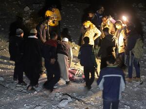 Syrian civil defence volunteers, known as the White Helmets, dig through the rubble of a mosque following a reported airstrike in the village of Al-Jineh in Aleppo province on March 16, 2017. (AFP/Omar Haj Kadour)