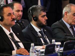 Chief opposition negotiator Mohammad Alloush (C) of the Jaish al-Islam looks on during the second session of Syria peace talks at the Rixos President Hotel in Astana, on February 16, 2017. (AFP/Stanislav Filippov)