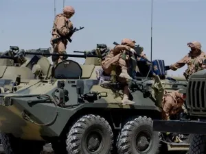 Russian army soldiers are seen with their vehicles at their military camp, known as the International Demining Center, in the ancient Syrian city of Palmyra . (AFP/ File Photo)