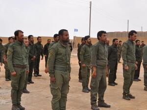 Cadets from the Interior Security Forces of Raqqa, the first police force formed by the international coalition in charge of maintaining order in Syria's northern Raqa province, take part in a training in the courtyard of a school in Ain Eissa, some 50 kilometres north of Raqqa on May 23, 2017. (AFP/Ayham al-Mohammed