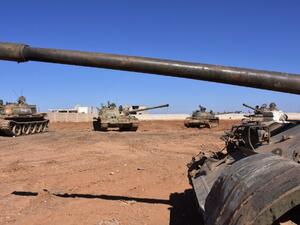 Syrian army tanks are positioned on the eastern outskirts of the northern Syrian city of Aleppo on February 17, 2017. (AFP/George Ourfalian)