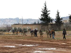 A large number of civilians are forced to flee their homes every day as Turkish-backed militants make advances in the city. (AFP/File) 

