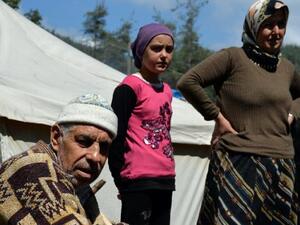 Syrian Turkmen at a camp on the border. (AFP/File)