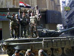 The intelligence official reportedly refused to vacate his villa in the southern Syrian city of Daraa to make room for an increased number of Iranian and Lebanese Hezbollah affiliates fighting with the Syrian government. (AFP/File) 