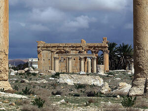A photo taken on March 14, 2014, shows the Temple of Baal Shamin through two Corinthian columns in the ancient oasis city of Palmyra. (AFP/Joseph Eid)