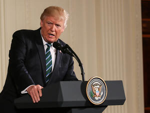 Shortly after the announcement, Trump tweeted what looks like a movie poster image of himself walking that takes creative inspiration from the TV series “Game of Thrones” to announce the reimposition of sanctions. (Shutterstock)