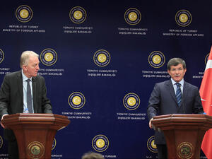 Turkish Foreign Minister Ahmet Davutoglu (R) gives a press conference with his Danish counterpart.  Davutoglu denies Turkey shared intelligence with Israel to expose an Israeli spy ring. (Image credit: AFP)



