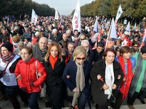 People hold flags during a demonstration against the presidential system on December 4, 2016 at Anitkabir in Ankara. (AFP/Adem Altan)