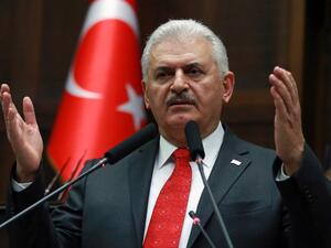 Turkish Prime Minister and the leader of Turkey's ruling party, Justice and Development Party (AK Party) Binali Yildirim gives a speech during the AK Party's group meeting at the Grand National Assembly of Turkey (TBMM) in Ankara, on February 7, 2017. (AFP/Adem Altan)