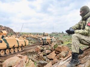 Turkish army tanks and troops gather near Hassa, in Hatay province, for push into Syria. (AFP/File)