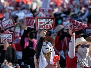 Protesters in Seoul at an August rally against spycam porn, known as 'molka'. (AFP/FILE)