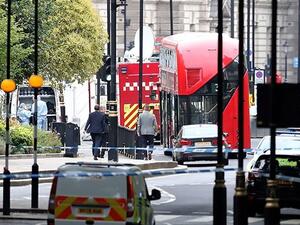Police forensics officers outside the Houses of Parliament following an incident where a car crashed into barriers on Aug. 14, 2018. (AFP/ Photo)