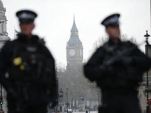 Armed police secure the area around the Houses of Parliament (AFP)