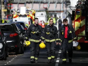 Thirty people sustained mostly flash burn injuries on Friday when an improvised explosive device partially exploded in an underground train (Adrian Dennis/AFP)