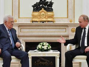 Russian President Vladimir Putin receives Palestinian President Mahmoud Abbas in Moscow. (AFP)