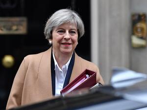 British Prime Minister Theresa May leaves 10 Downing Street before heading to the Houses of Parliament to attend the weekly Prime Minister's Questions (PMQs) in central London on March 29, 2017. (AFP/Ben Stansall)