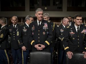 Army General David Rodriguez (C), commander of the US Africa Command, and Army General Joseph Votel (R), commander of the US Special Operations Command, wait for a hearing of the Senate Armed Services Committee on March 8, 2016 in Washington, DC. (AFP/Brendan Smialowski)
