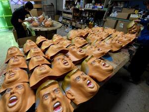 Employees producing rubber masks of US President-elect Donald Trump at the Ogawa Studios mask factory in Saitama, north of Tokyo. (AFP/Toshifumi Kitamura)