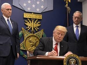 US President Donald Trump signing an executive order at the Pentagon.  (AFP Photo/Mandel Ngan)