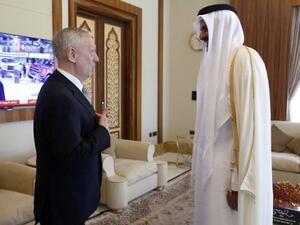 Defense Secretary James Mattis with Qatar's emir Tamim Bin Hamad Al-Thani. (AFP/ File Photo)