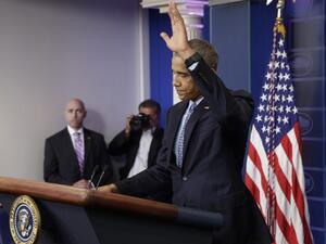 Outgoing US President Barack Obama waves goodbye at his final press conference at the White House on January 18, 2017.(AFP/Yuri Gripas) 