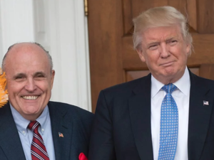 U.S. President lawyer Rudy Giuliani (L) and President Donald Trump. (Don Emmert /AFP)