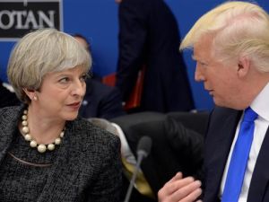 US President Donald Trump and British Prime Minister May have recently discussed the Russian diplomatic expulsion during a phone call. (AFP/ File Photo)
