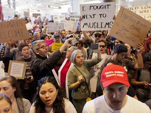 Protesters gather at the Los Angeles International airport to demonstrate against President Trump's executive order effectively banning citizens from seven Muslim majority countries. (AFP/Konrad Fiedler)
