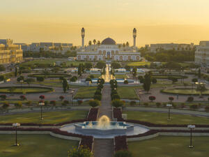 Beautiful golden sunrise view of a garden leading to a mosque in Muscat, Oman. (Shutterstock/ File Photo)