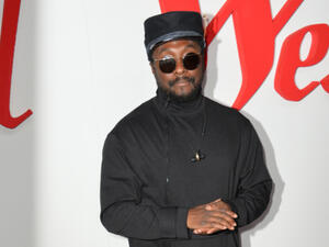 The Black Eyed Peas singer has admitted he'd love nothing more than to open or close the ceremony at the forthcoming international multi-sport event in his hometown (Source: Featureflash Photo Agency - Shutterstock)