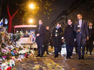 World leaders gather to pay tribute to the victims of the Paris attacks, 2015 (AFP)