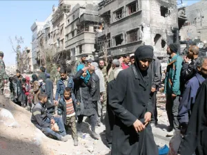 The Yarmuk refugee camp hosts an estimated 18,000 Palestinian refugees, a fraction of the approximately 150,000 refugees living there until Syria's uprising in 2011. (AFP/File)
