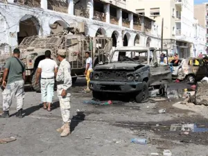 People gather at the site of a car bomb explosion next to the central bank in Yemen's second city of Aden. (AFP/ File)