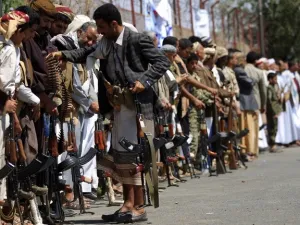 Houthi fighters parade with their weapons in Sanaa last month (AFP/file photo)