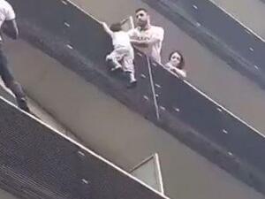 Paris man climbs four stories to save toddler (Twitter)