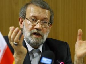 Iran's Parliament Speaker Ali Larijani told reporters Wednesday that Iran had more uranium than it needed, but other Iranian MPs have denied his claim (Reuters)