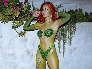 She accessorized with green sleeves and flora-adorned heels (Source: iamhalsey / Instagram) 