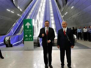 Israeli PM Benjamin Netanyahu (R) stands next to Israel's transportation and intelligence minister Yisrael Katz. (AFP/File)