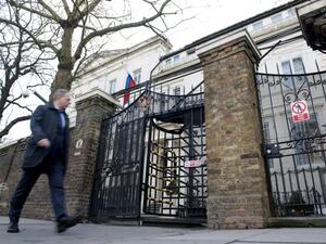 A man passes near the Russian embassy in London (AFP/File Photo)	