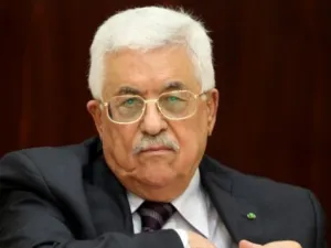 The PA, headed by Mahmoud Abbas will return to Gaza in December (AFP)