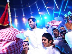 Kuwaiti student Rajih al-Hamidani celebrates after winning the TV poetry competition 'Million's Poet' in Abu Dhabi on May 17, 2016.  (AFP/File)